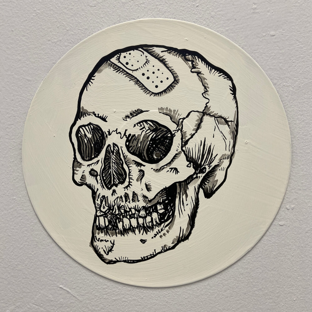 33-John Casey Round human skull.jpg