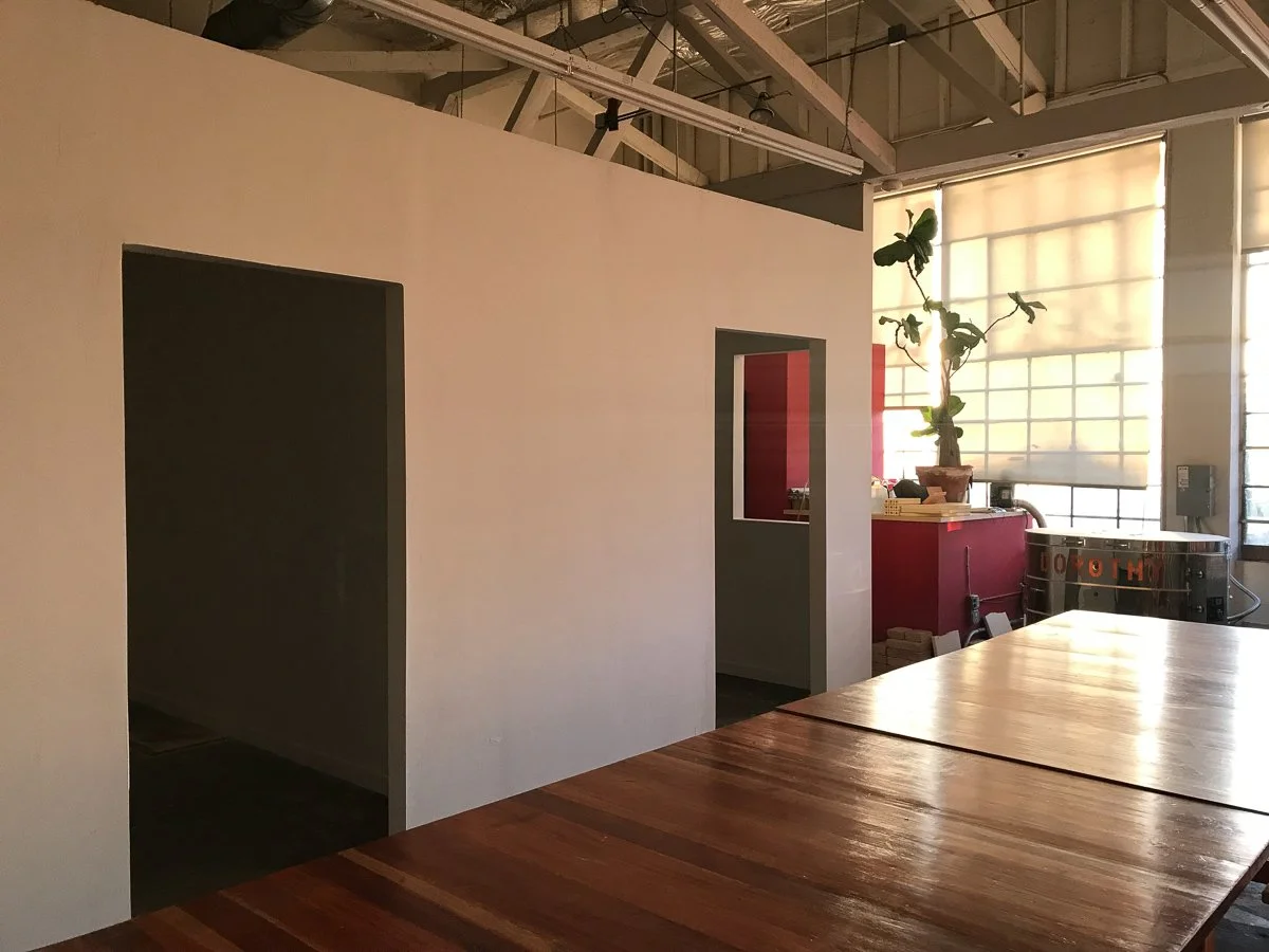 common art areas and tables at Faultline Artspce
