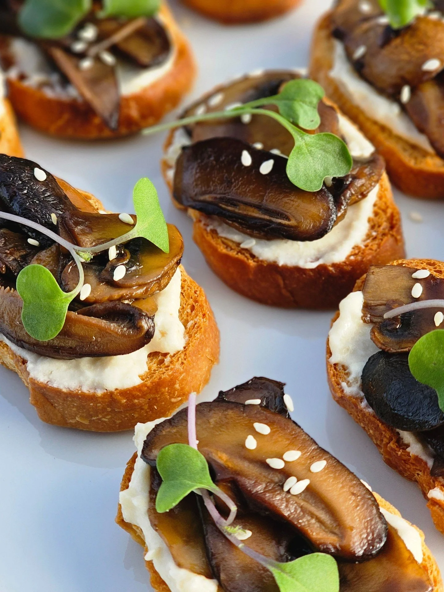 Earthy roasted mushrooms. Creamy whipped ricotta.
A toasted crunch that hits different.
And yeah — we threw on microgreens because we’re that extra.
This is how we do hors d’oeuvres.
No boring trays. No bland bites. Just bold flav