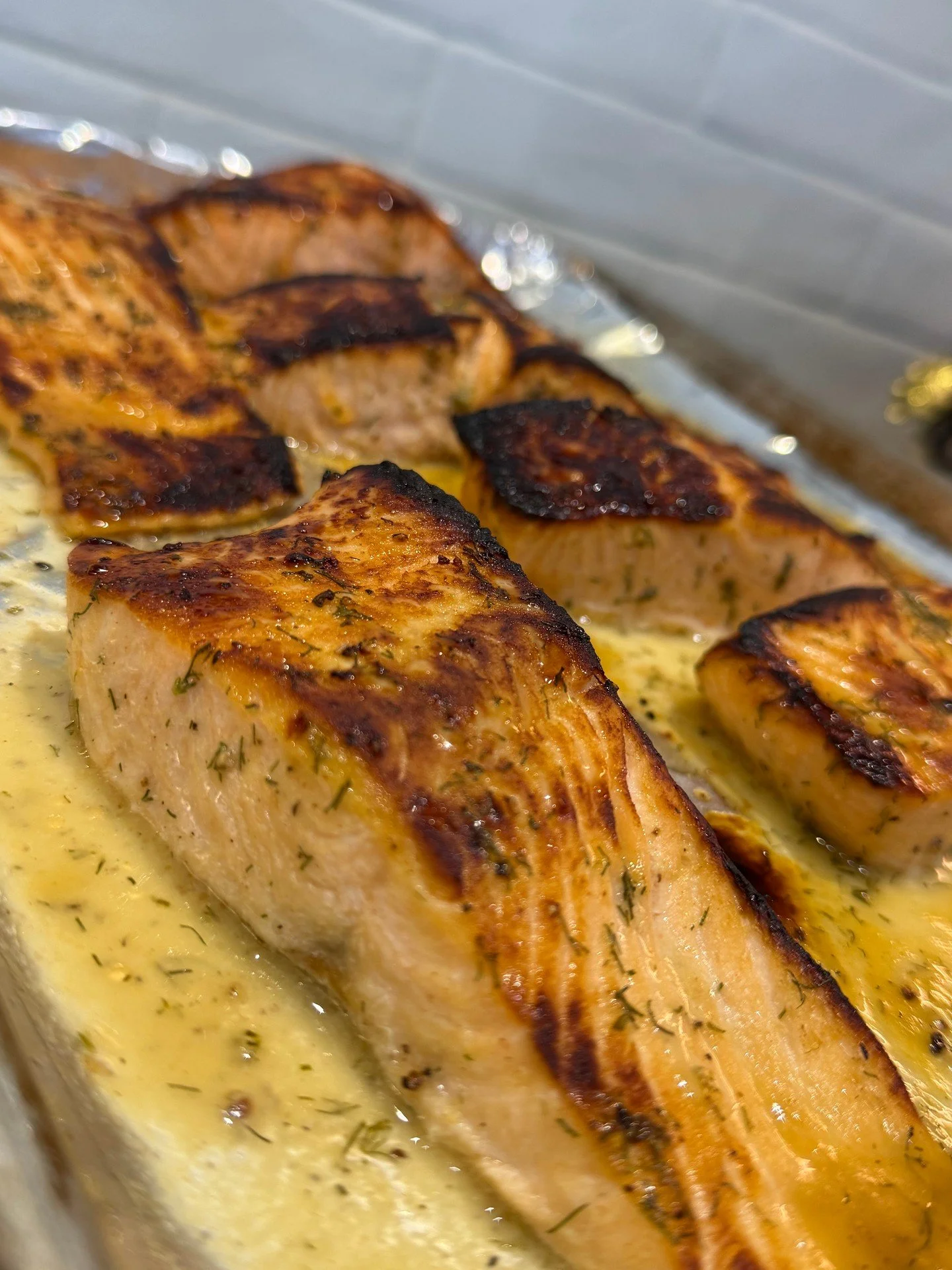 This isn’t just salmon.
It’s citrus-dill roasted, basted, and broiled until it sings.
That golden crust? Comes from perfectly timed heat and a whole lotta love.
No shortcuts. No soggy middles. Just flavor that makes you stop mid-bite and