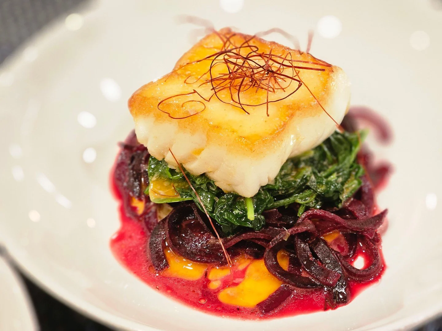 This isn’t just dinner! It’s drama in three acts:
🎭 Beet linguine with a kiss of citrus beurre blanc
🌿 Garlicky sautéed greens layered with intention
🐟 Pan-seared cod, golden-crusted and buttery-soft inside
Finished with delic