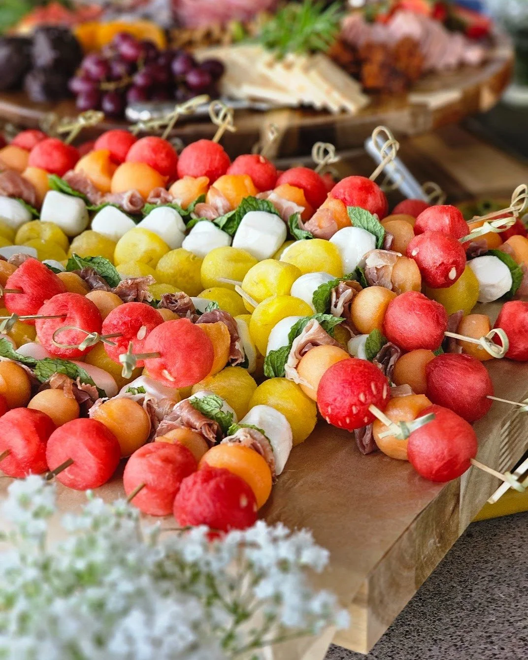 Let&rsquo;s talk about the table everyone crowds around.

Color. Texture. Grab-and-go bites that somehow feel effortless but look like a whole production.

This is the kind of spread that turns
&ldquo;I&rsquo;ll just have one&rdquo; into&hellip; five