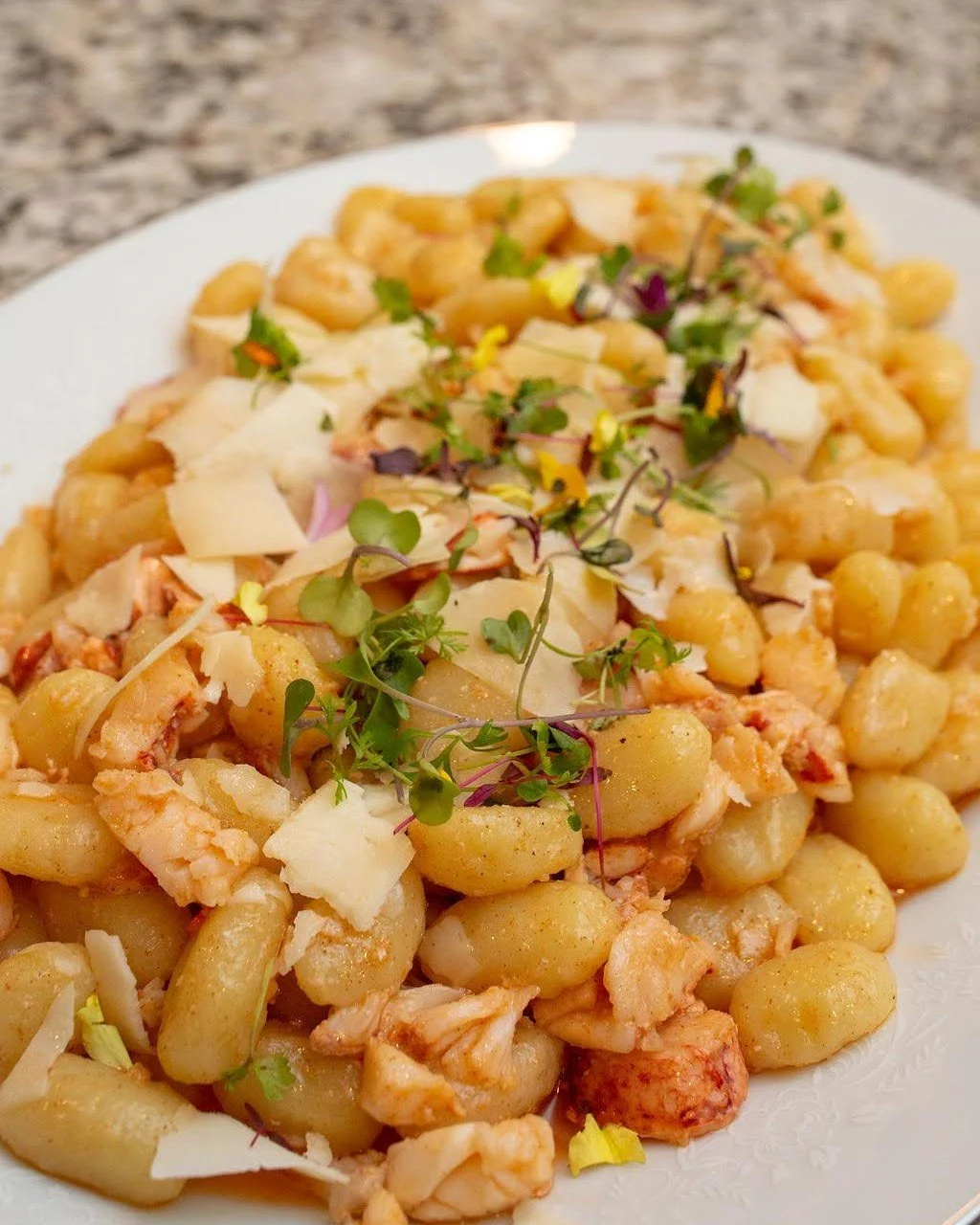 This is what "done right" looks like. 🦞✨

Pillowy gnocchi. Chunks of fresh lobster. Shaved parmesan and microgreens finishing it off like a chef who actually cares about the details &mdash; because she does.

This isn't catering food. This