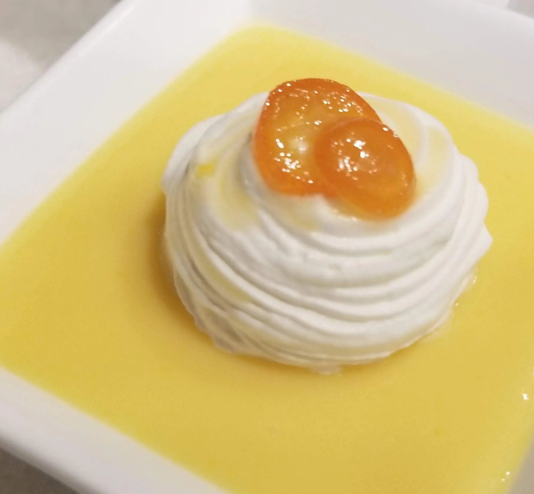 Saved the best for last. 🍋🤍
A swirled meringue nestled in a pool of silky lemon curd, crowned with candied kumquats. Light, bright, and absolutely unforgettable &mdash; exactly the way a dessert should end an evening.
Because the last bite is the o