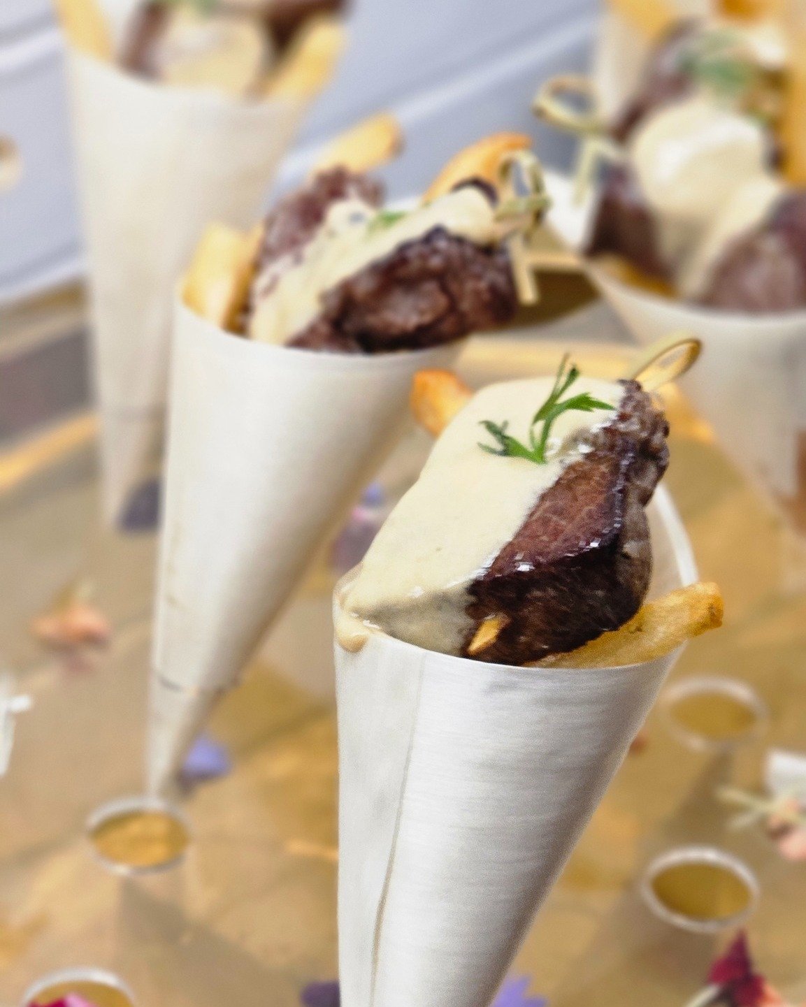 Steak Frites Cones

Who says elegant can't be fun?

Tender steak, crispy fries, and a rich finishing sauce served in a creative presentation that's guaranteed to impress your guests.

A modern twist on a classic favorite.

📱 858-405-5372
💻 busybeec