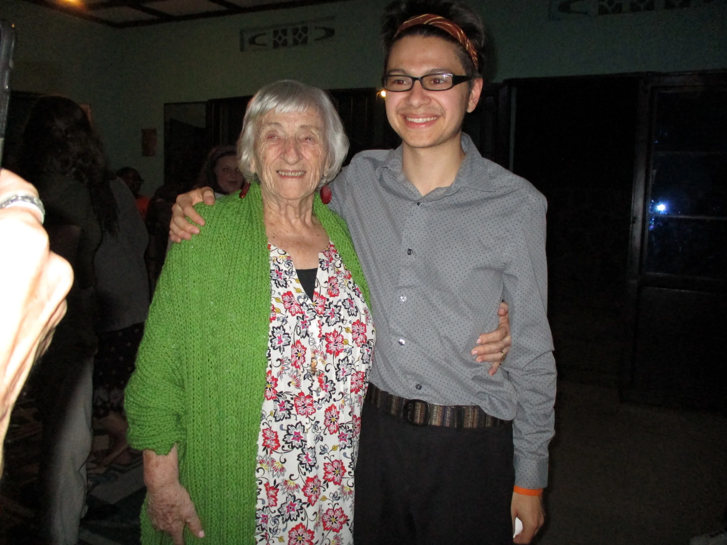 Mama receives a gift of a prayer shawl from Lucas.