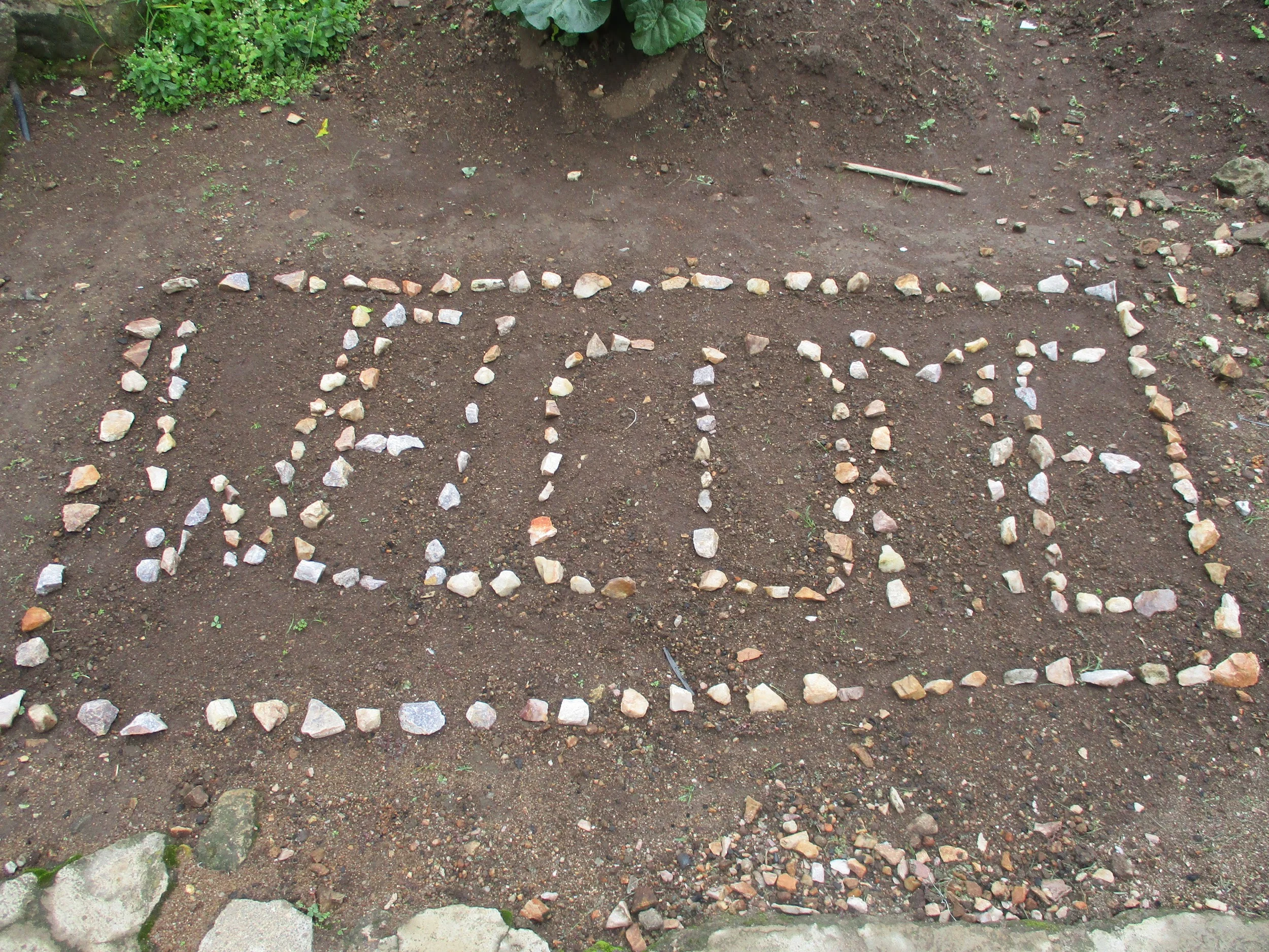 On the way to worship, I passed this lovely message in the children’s rock garden.