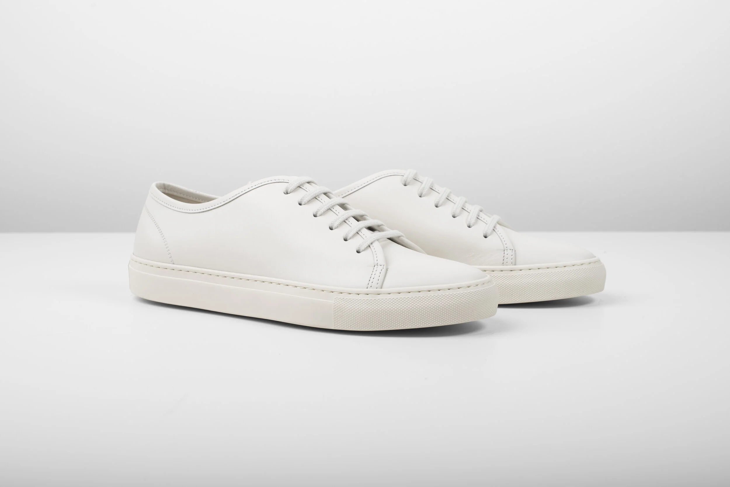 white minimal sneakers