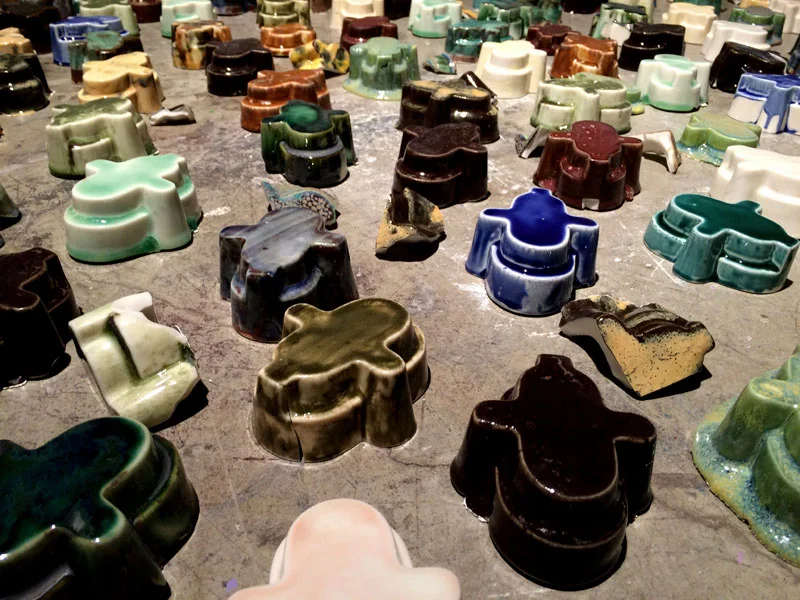 No Innocent Bystanders. Dimensions Variable. Porcelain Forms, Video Projection, Audio. (2014)