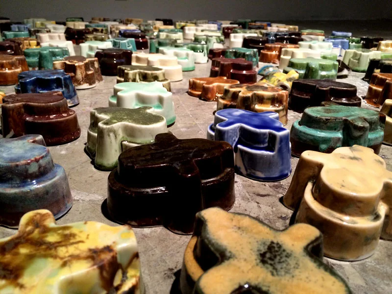 No Innocent Bystanders. Dimensions Variable. Porcelain Forms, Video Projection, Audio. (2014)