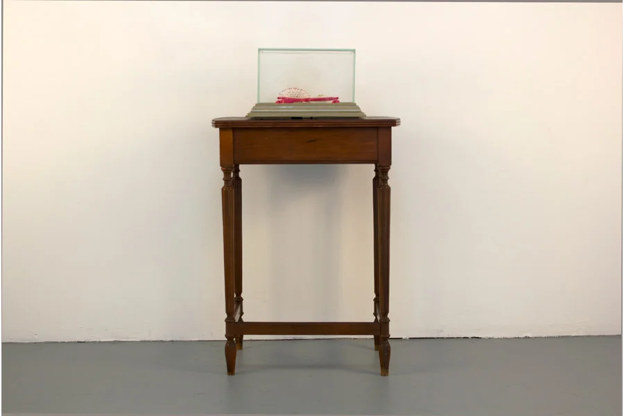 Whorebrush. 12" x 14" x 9" (without pedestal). Plastic Hairbrushes, Oven-Bake Clay, Ink, Glass, Wood, Metallic Paint. (2012)