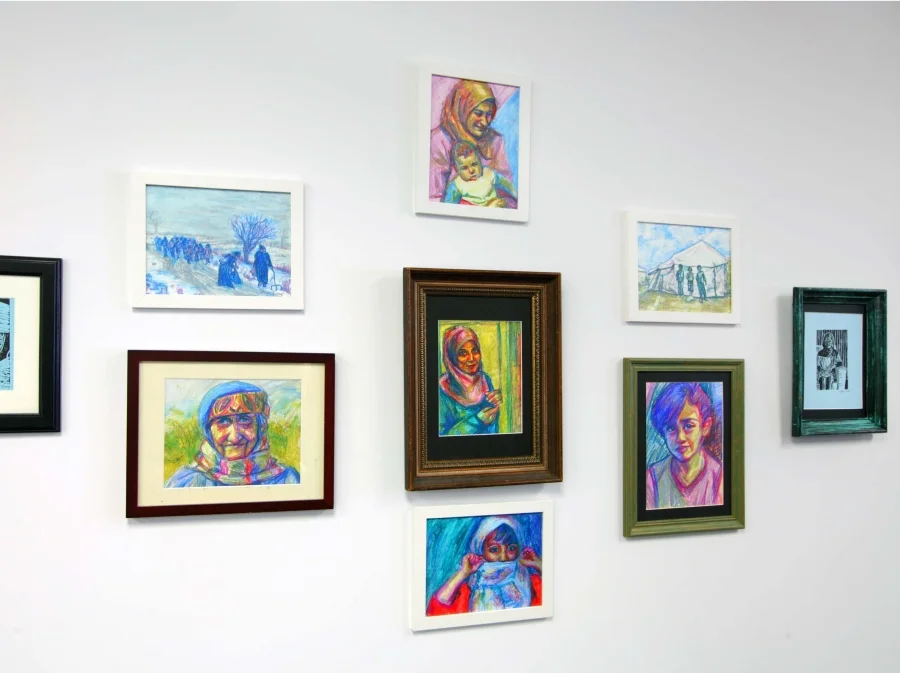 Installation view of pastel drawings by Paige Emery.