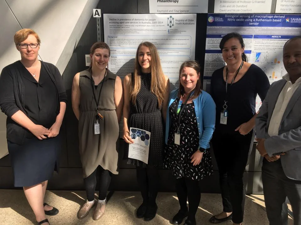 ROSA research team with Stephanie and her poster.jpg