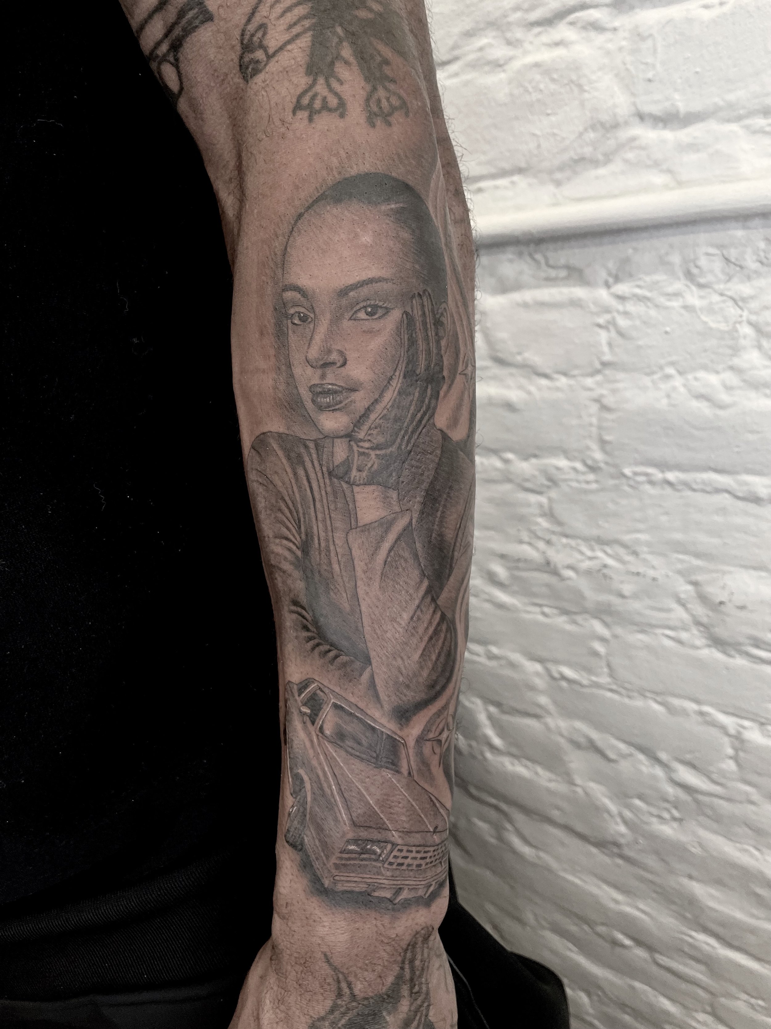 sade and old school tattoo