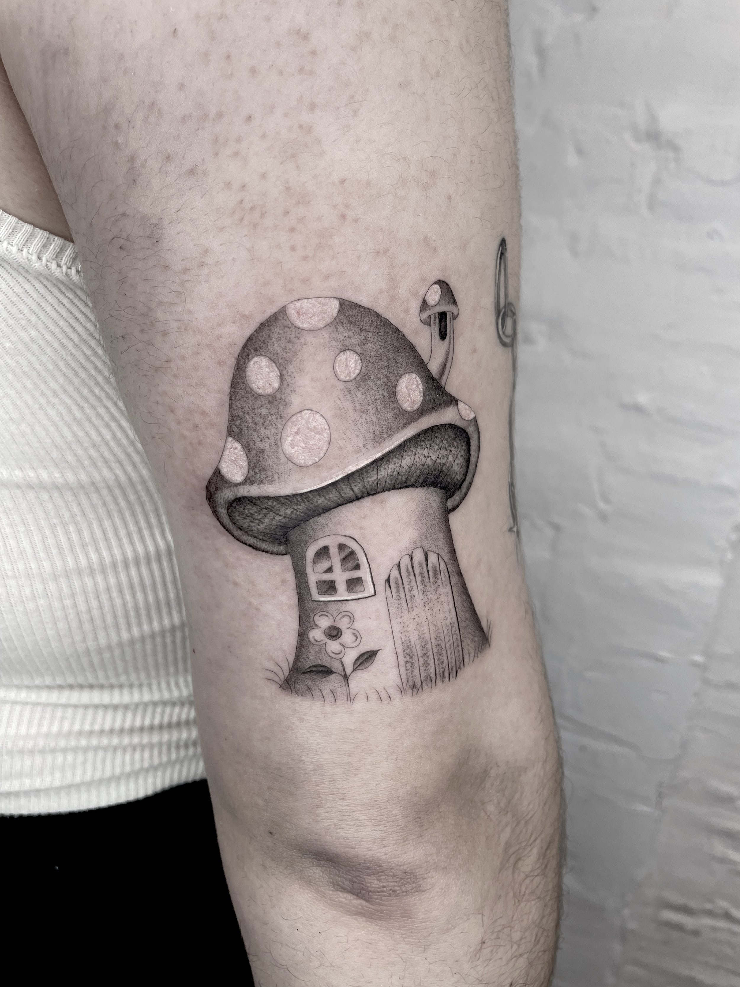 mushroom house tattoo