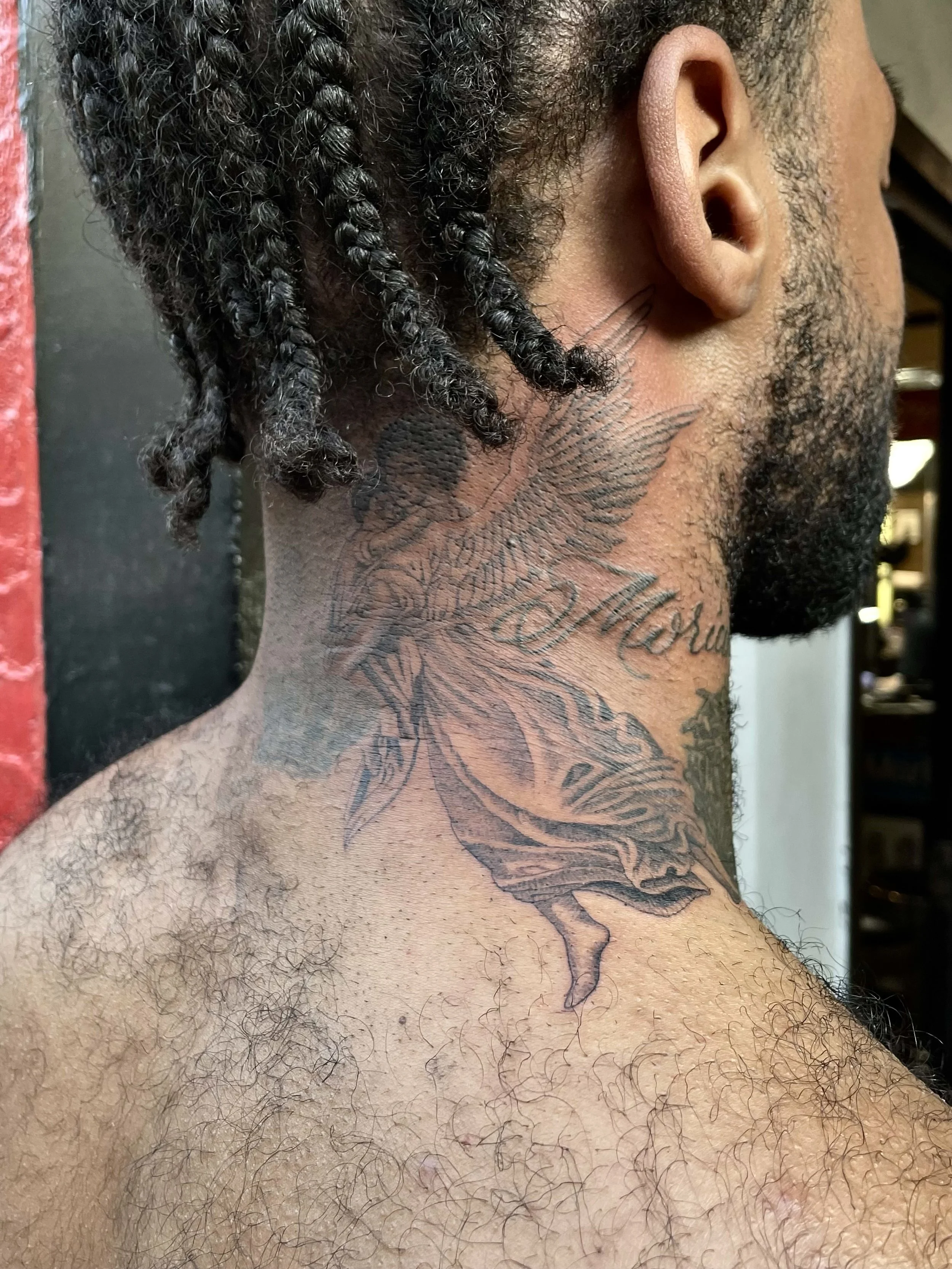 angel tattoo on the neck for caleb barnett
