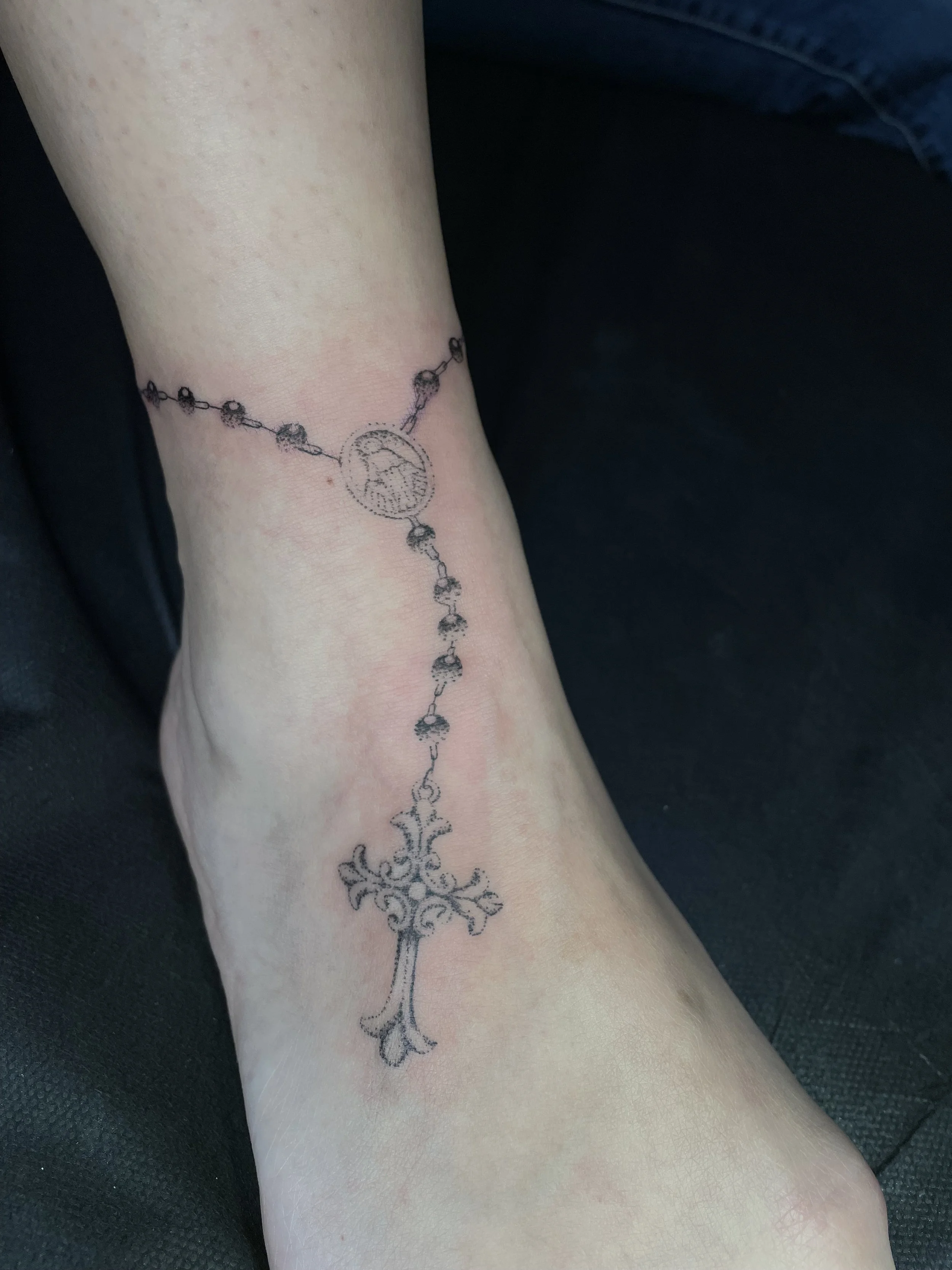 rosary ankle tattoo