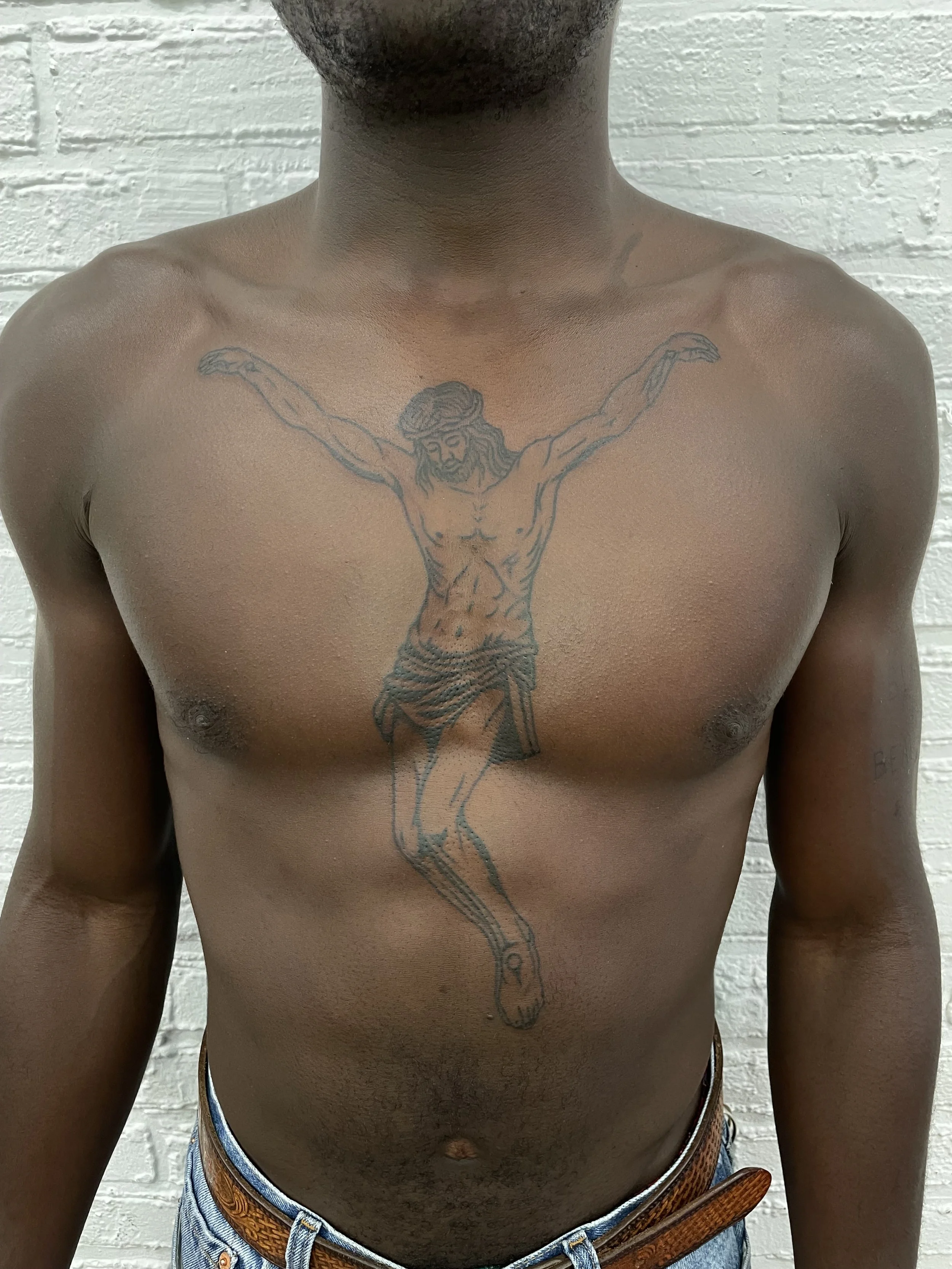 jesus christ tattoo over the chest