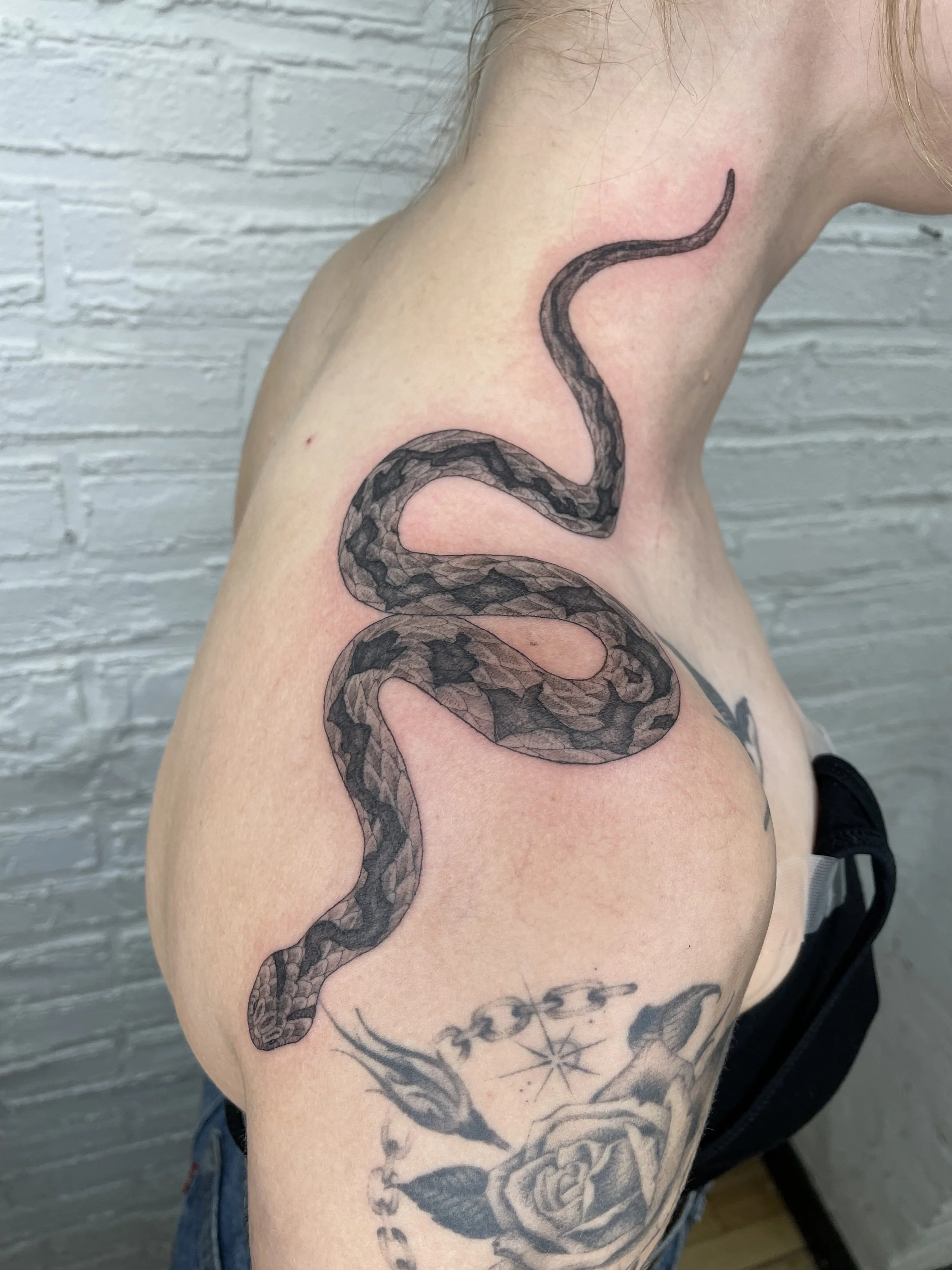 snake tattoo on neck