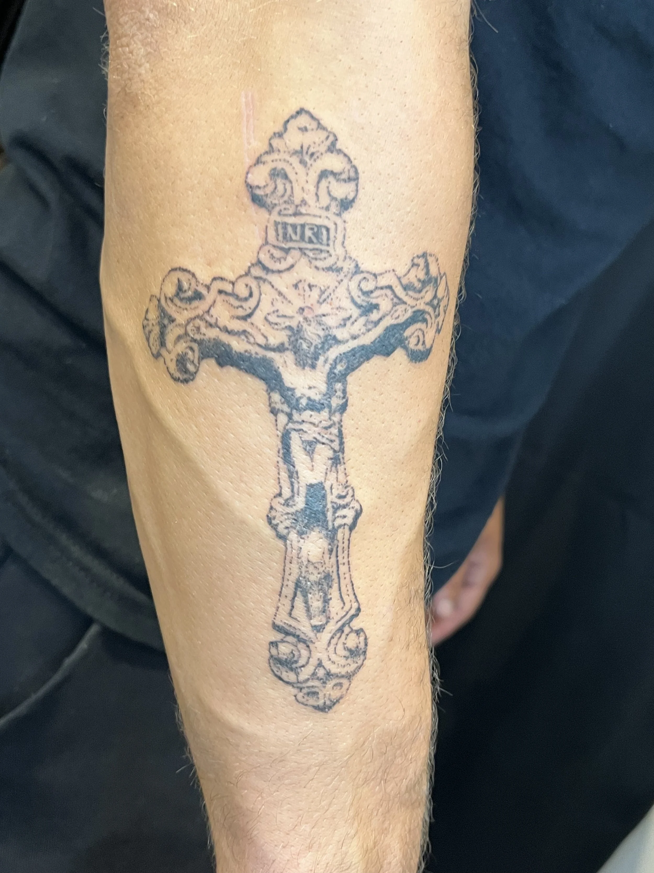 blackwork cross tattoo.jpeg