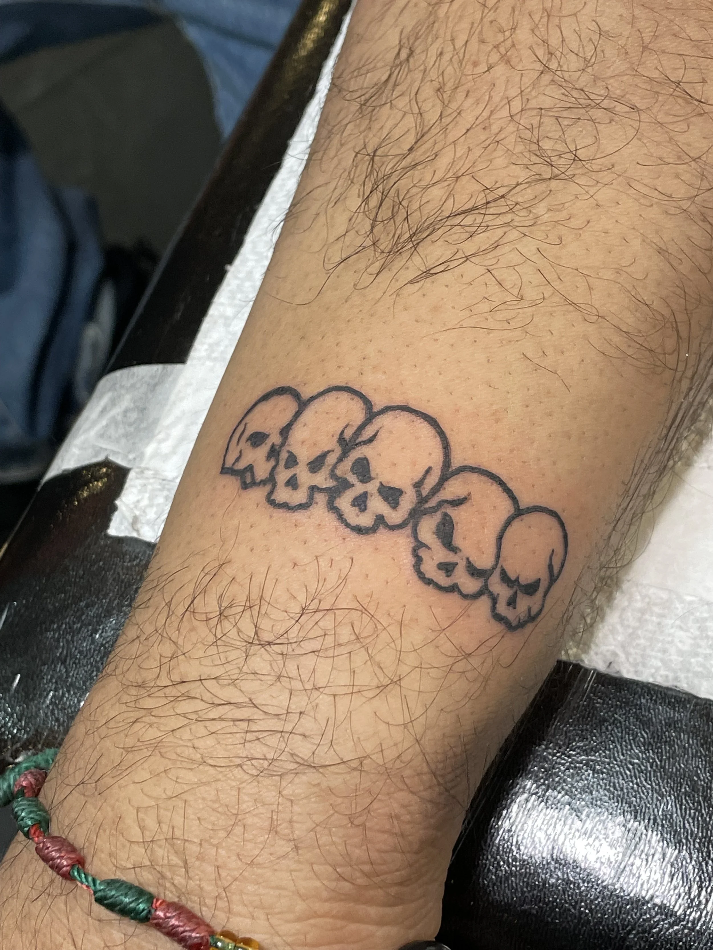 blackwork skulls tattoo.jpeg