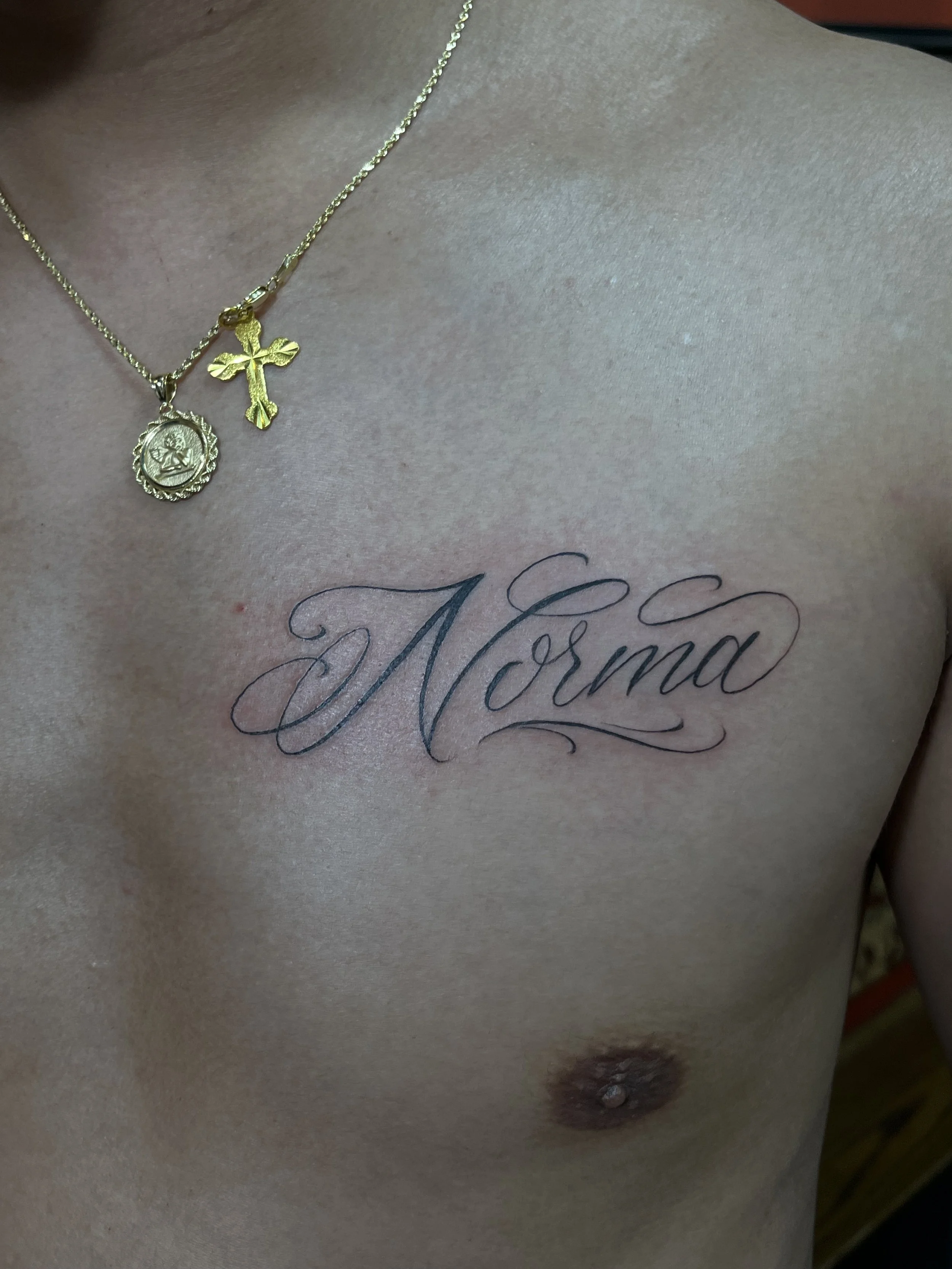 script name chest tattoo.jpeg