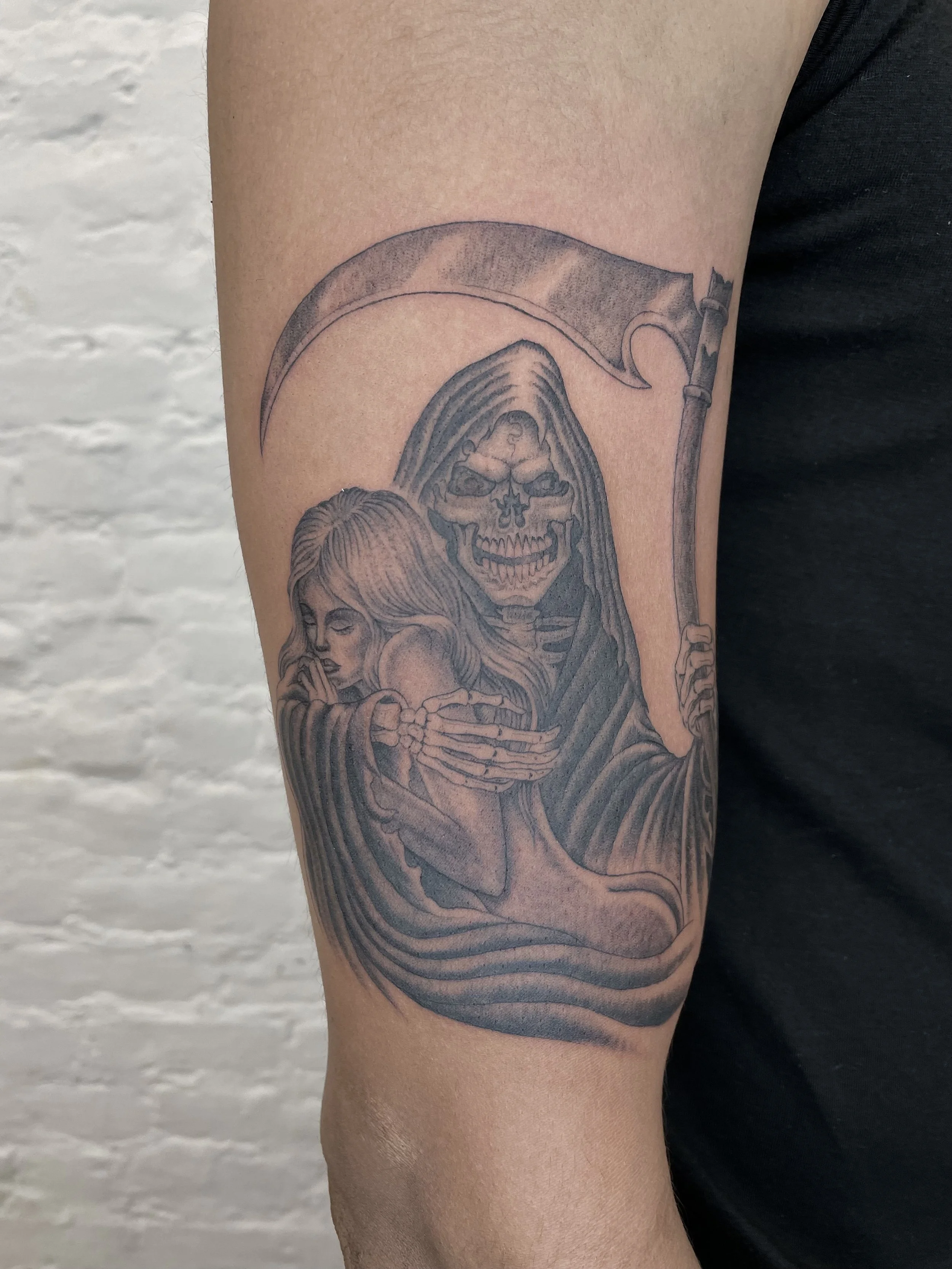 girl and reaper tattoo
