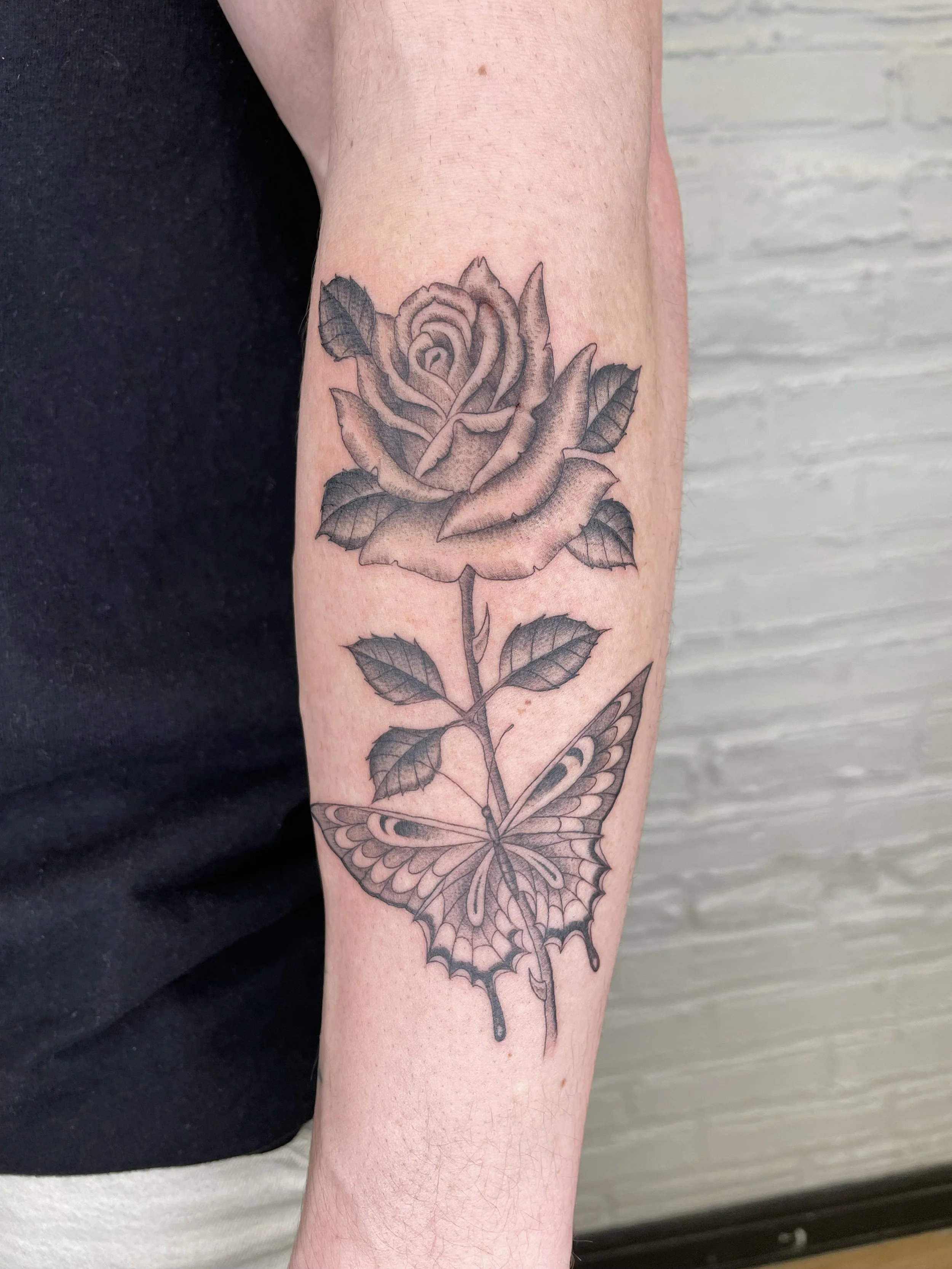 fineline rose and butterfly tattoo.jpeg
