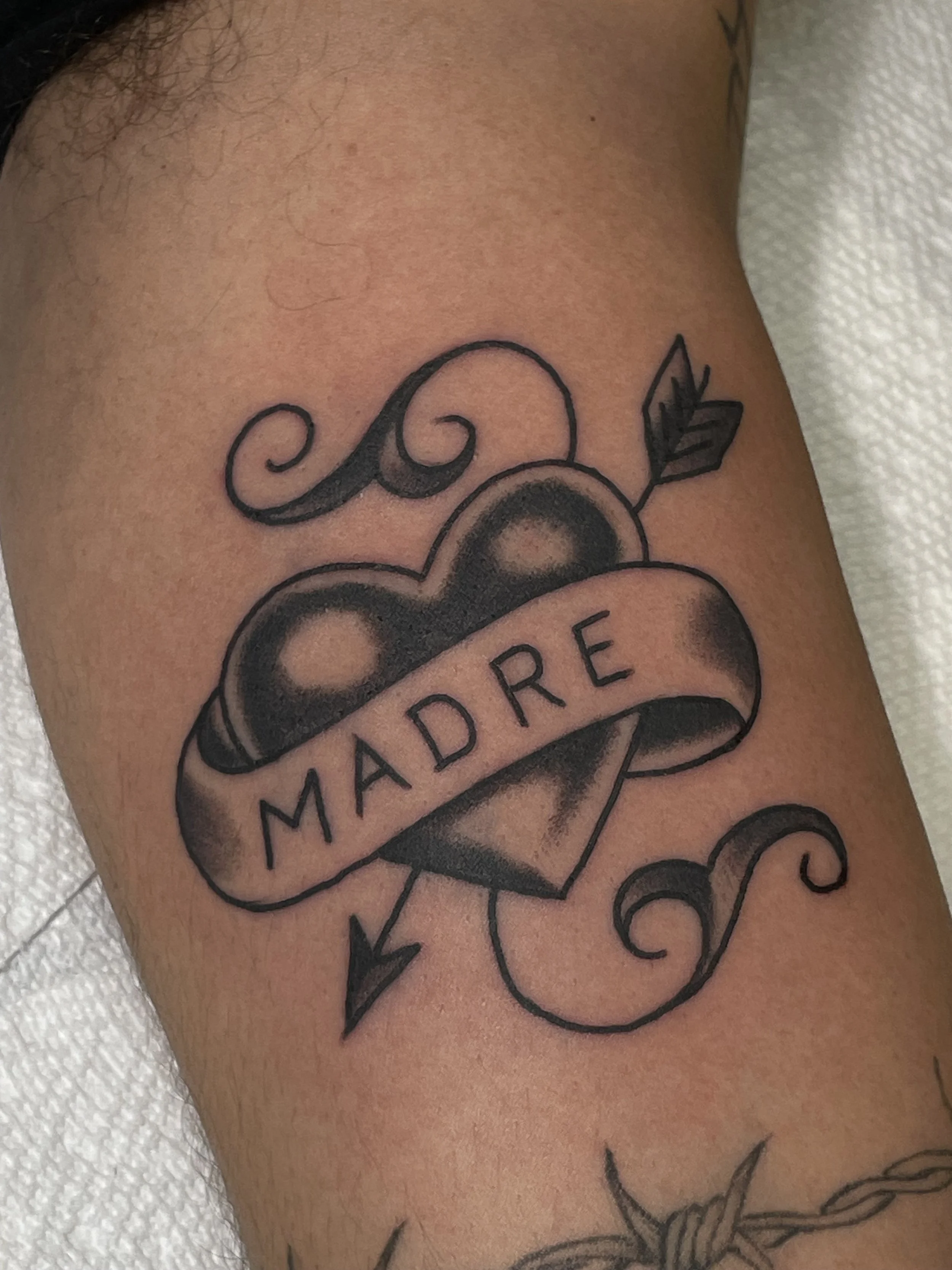traditional heart tattoo.jpeg