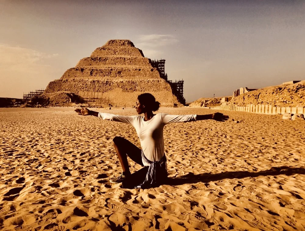 Return to Kemet Co-founder, Sarah Wes practices the pose of MAAT at Saqqara in Egypt
