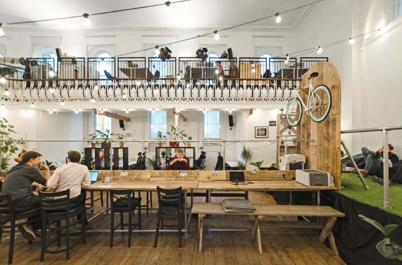 coworking space spread across two floors with fairy lights at Only Connect - on Tally Workspace
