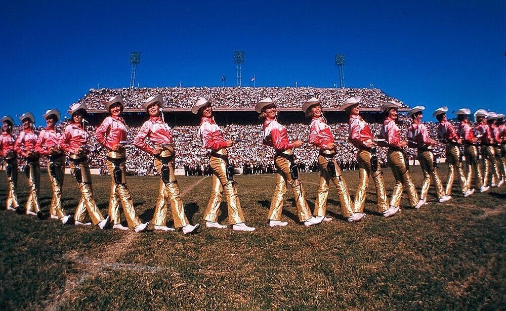 The Apache Belles performing in Dallas&rsquo; Cotton Bowl in the 1960s. The Apache Belles were formed in 1947 and represent Tyler Junior College in Tyler, Texas. They have performed throughout the USA including at the halftime show of Super Bowl XII 