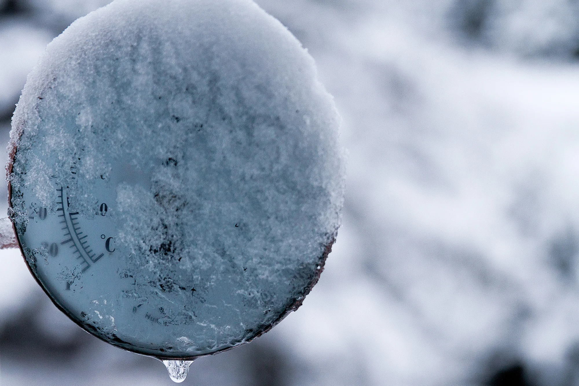 A photo by Mark McInnis of a snow covered thermometer.