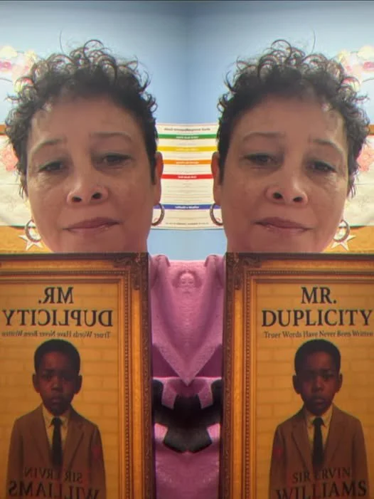 SHEKEY HOLDING BOOK.jpg