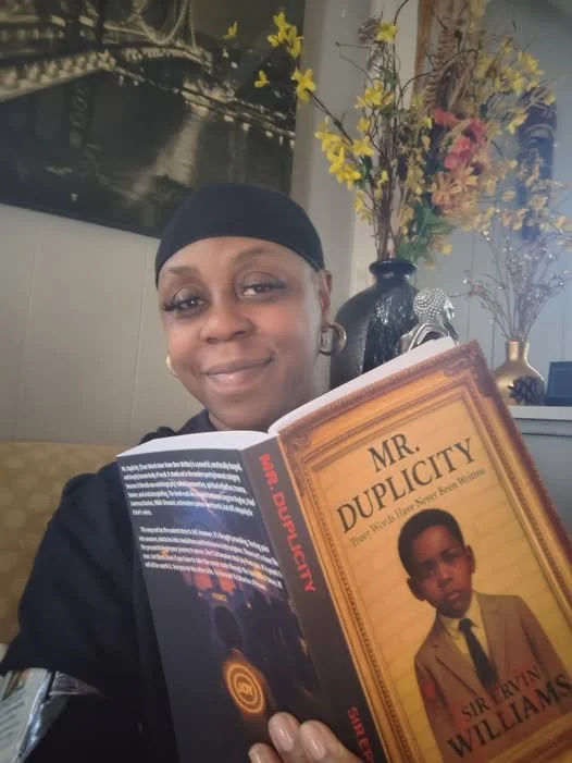 Shae holding book.jpg