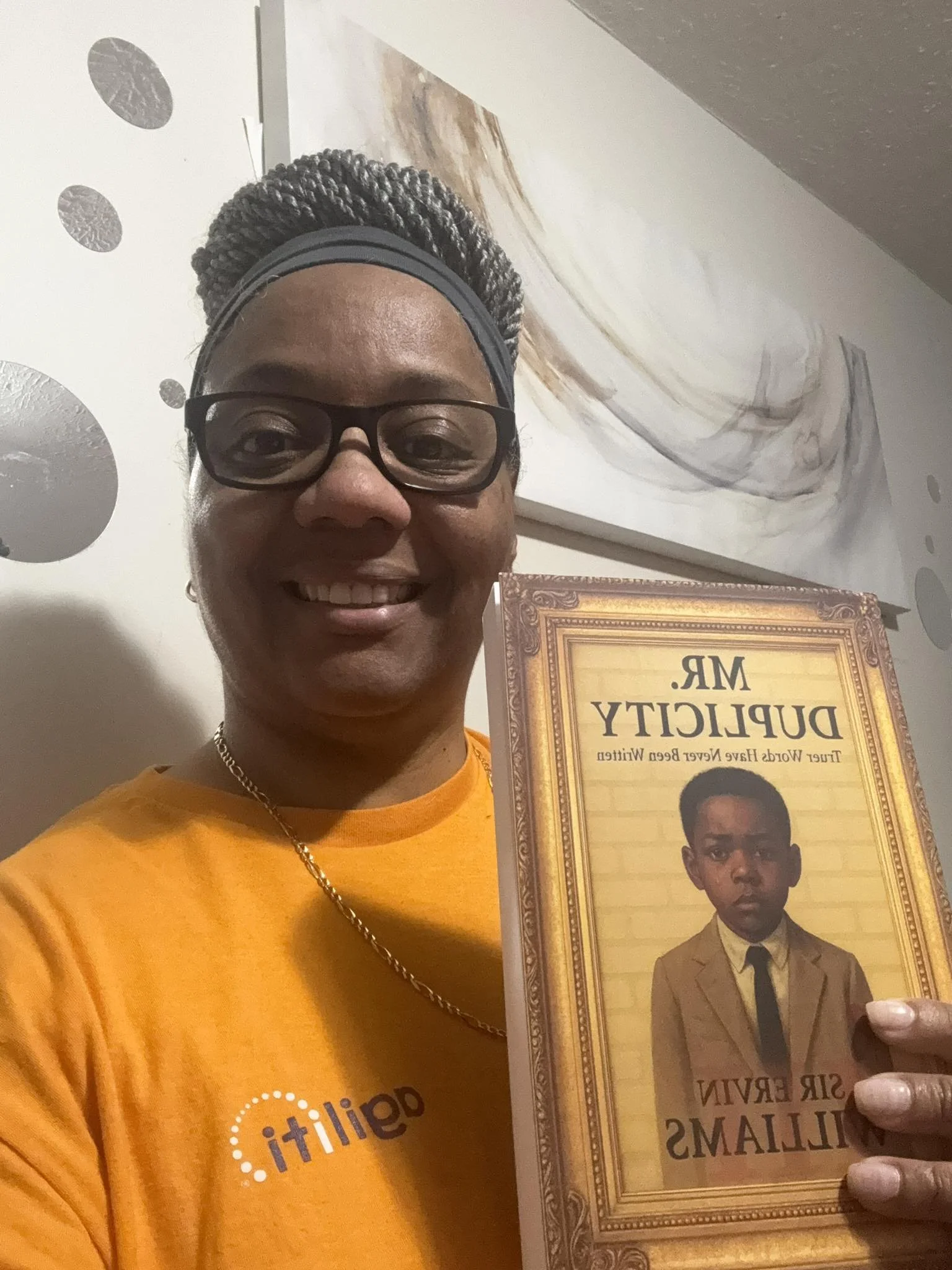 Renee holding book.jpg