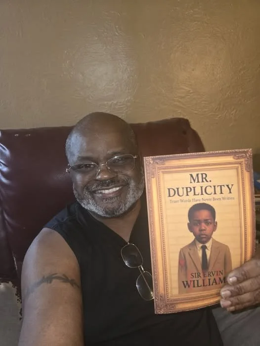 Cassius holding book.jpg