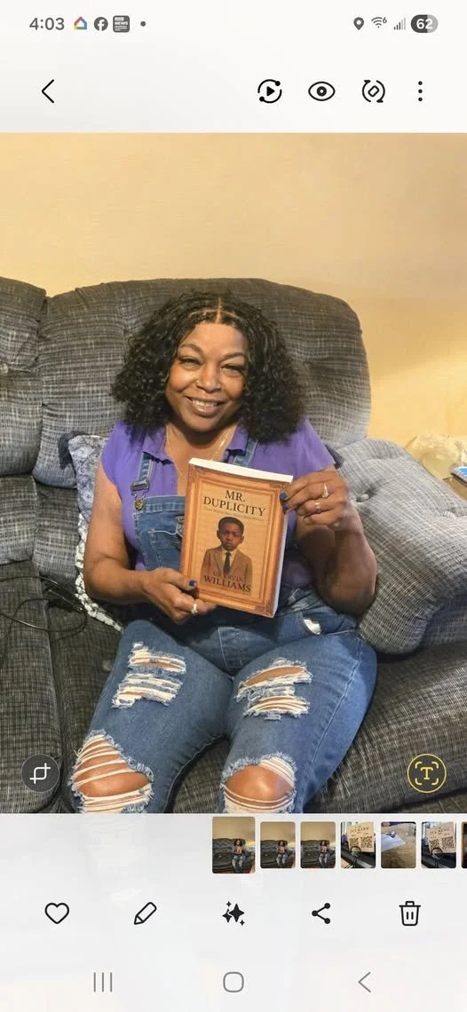 Velma holdin book.jpg