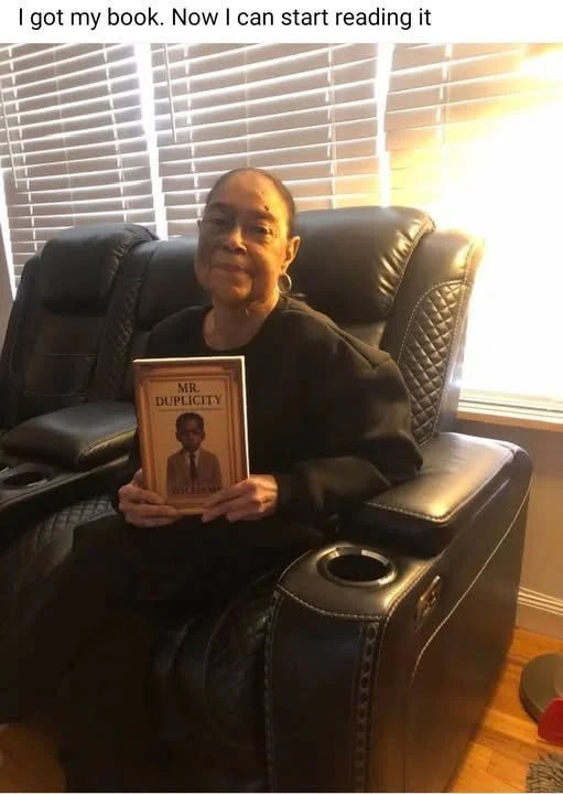 Aunt t holding book.jpg