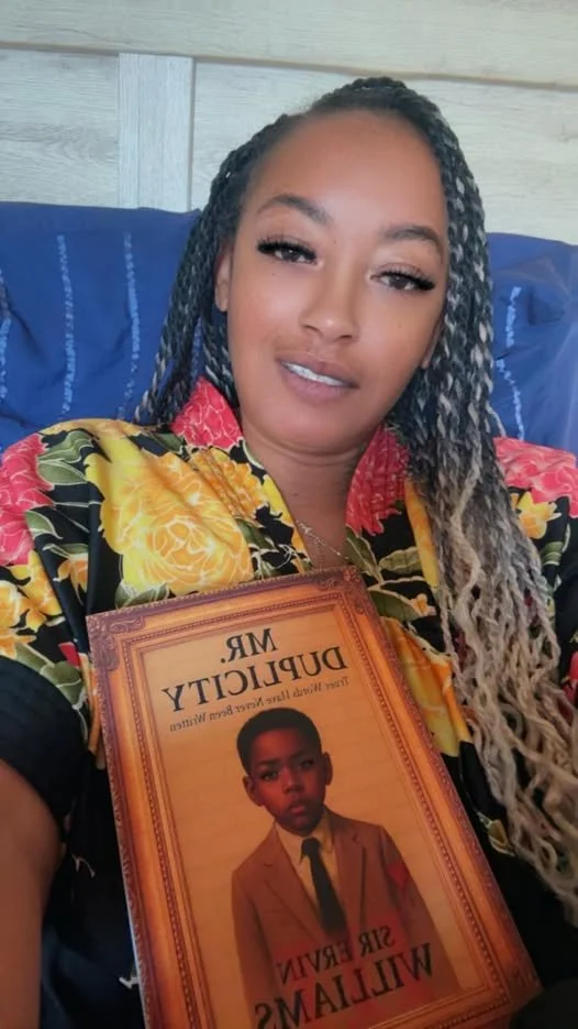 Shank holding book.jpg