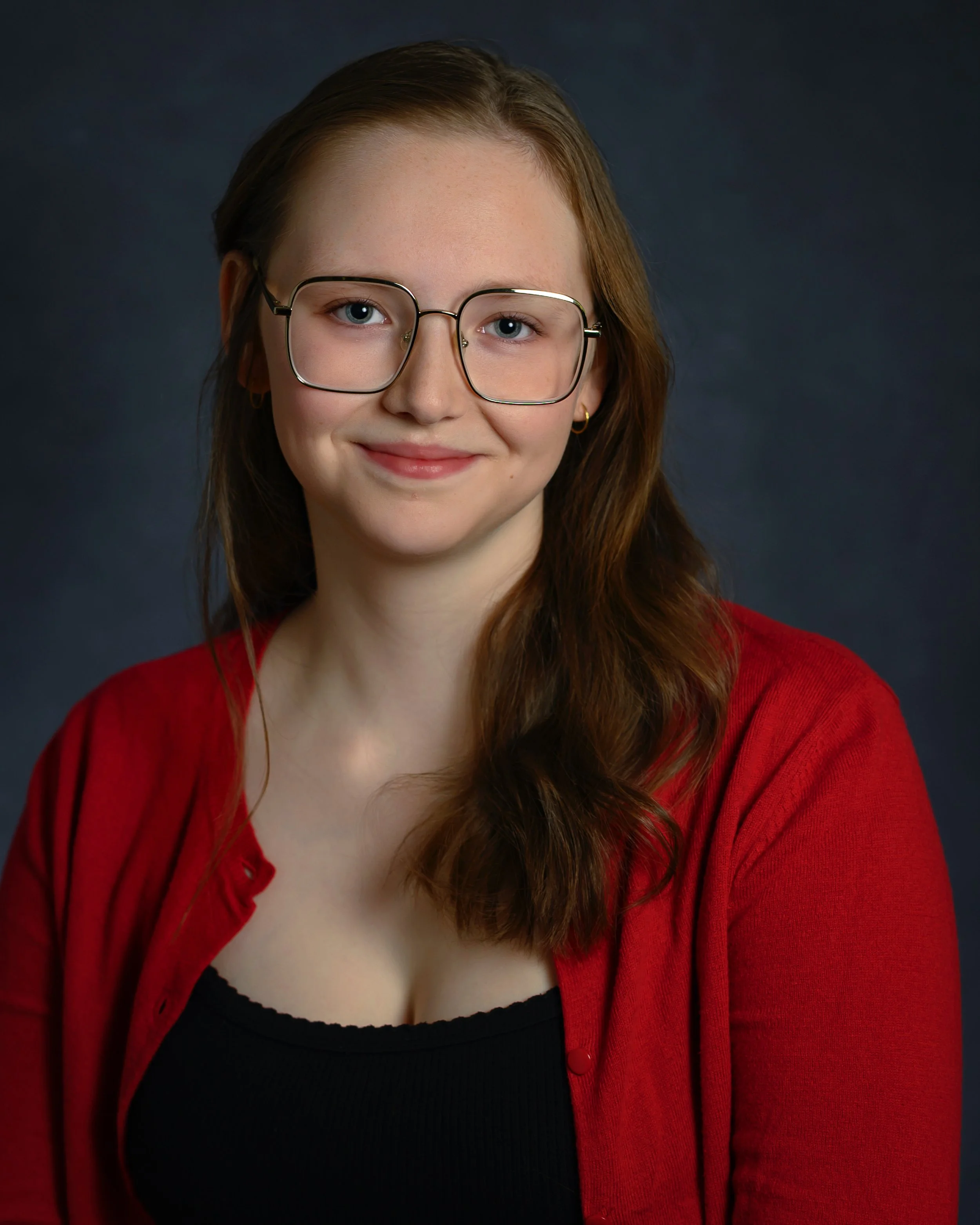 ZOË REIDER (SHE/HER)