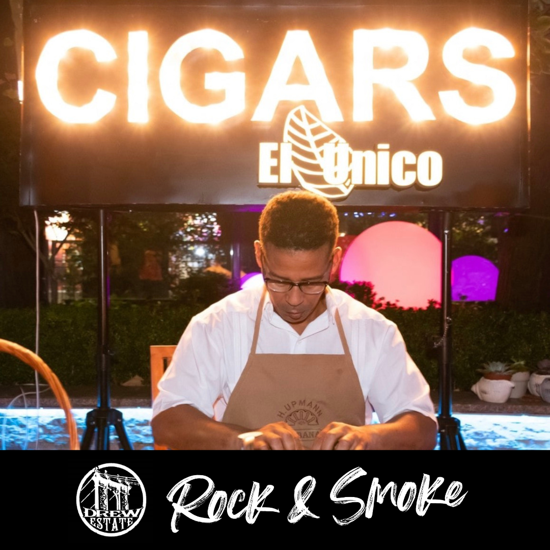 Man rolling cigars at El Unico Cigars