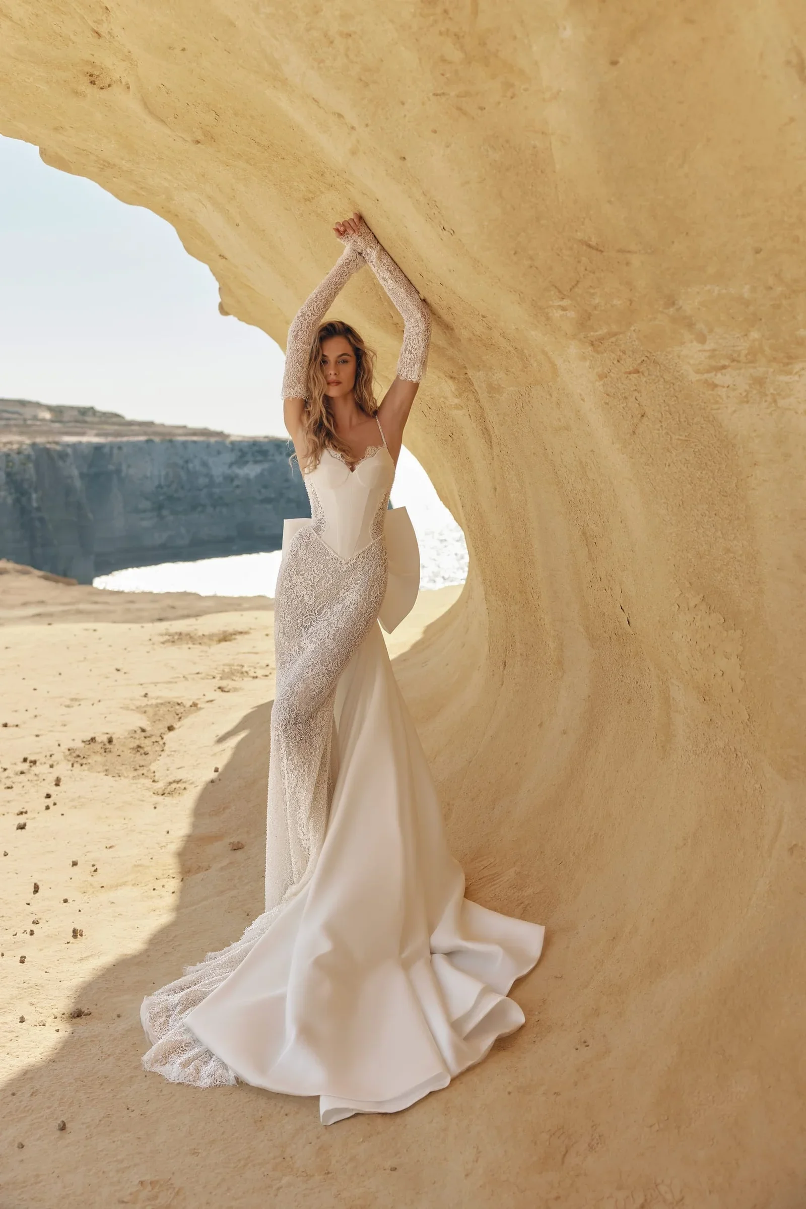 fitted clean wedding dress with lace sleeves milla nova manchester