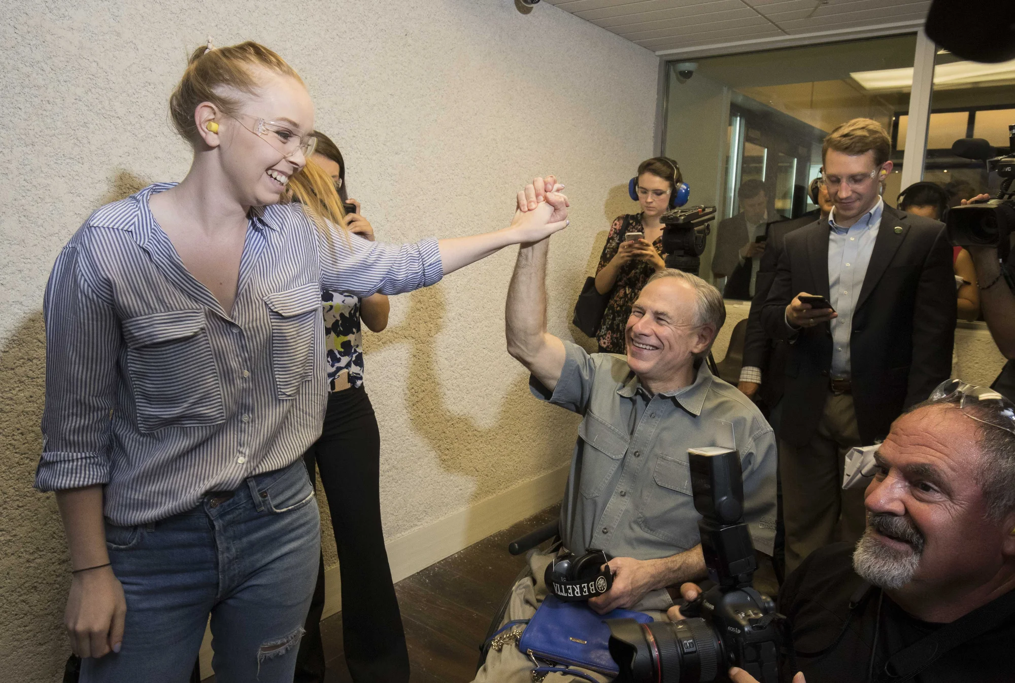 Audrey Abbott with dad at gun range 