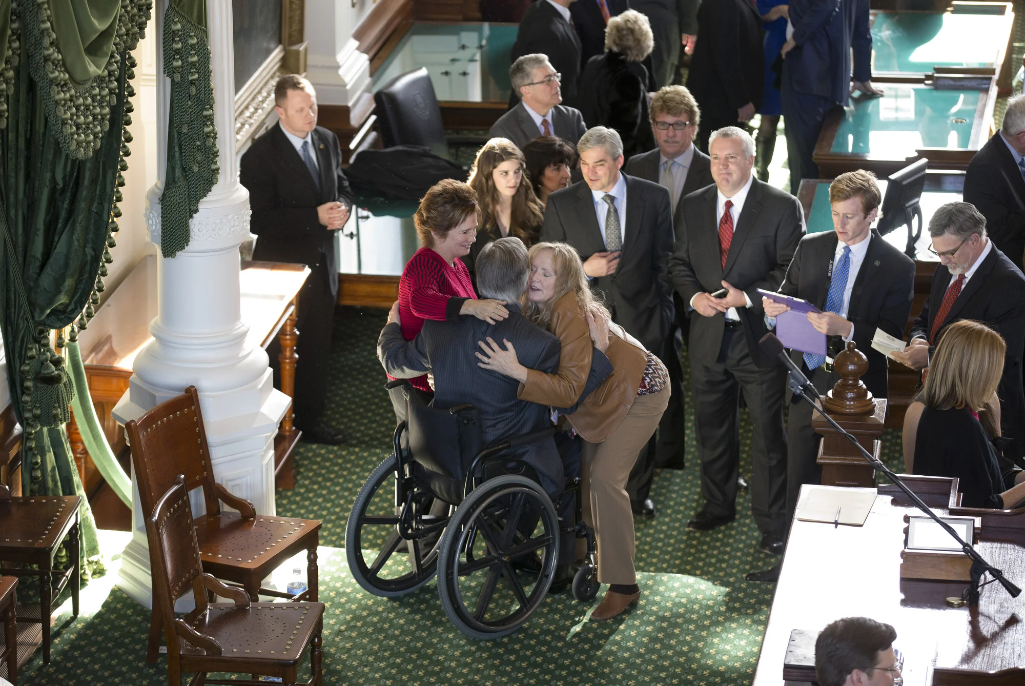 New Gov. Greg Abbott gets hugs