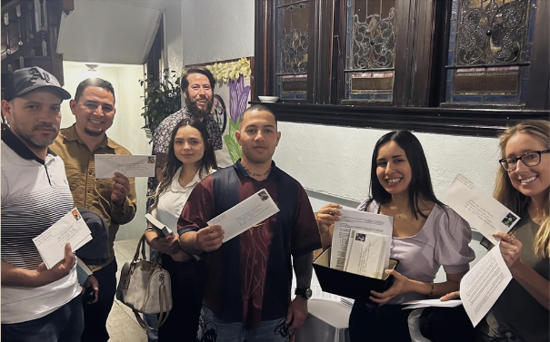Church members holding finished letters