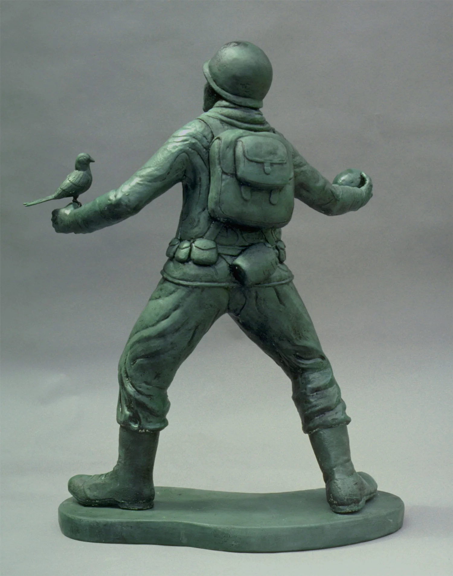 ARMY MAN WITH WATER BALLOONS back