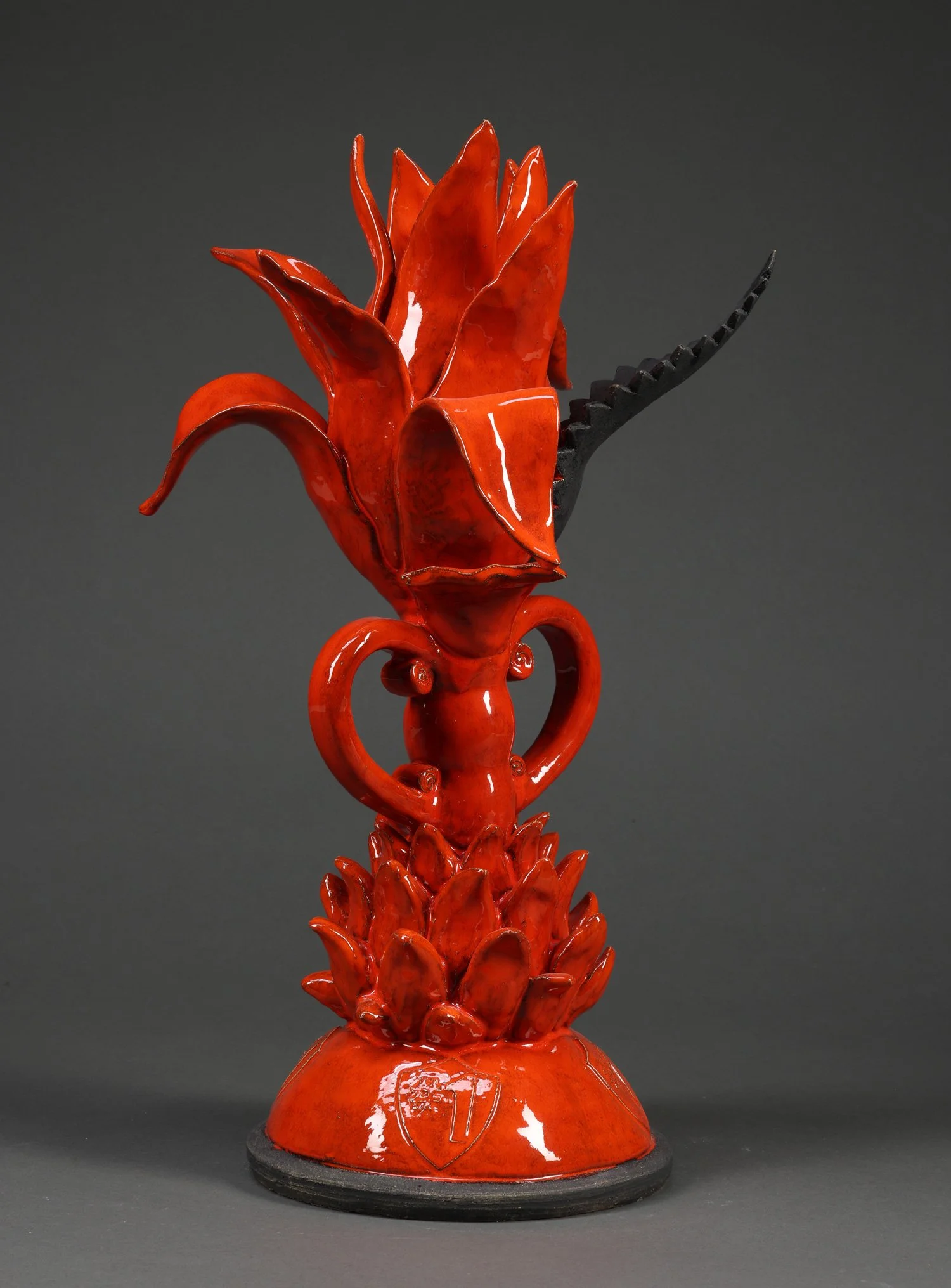 BLACK LEAF TROPHY left