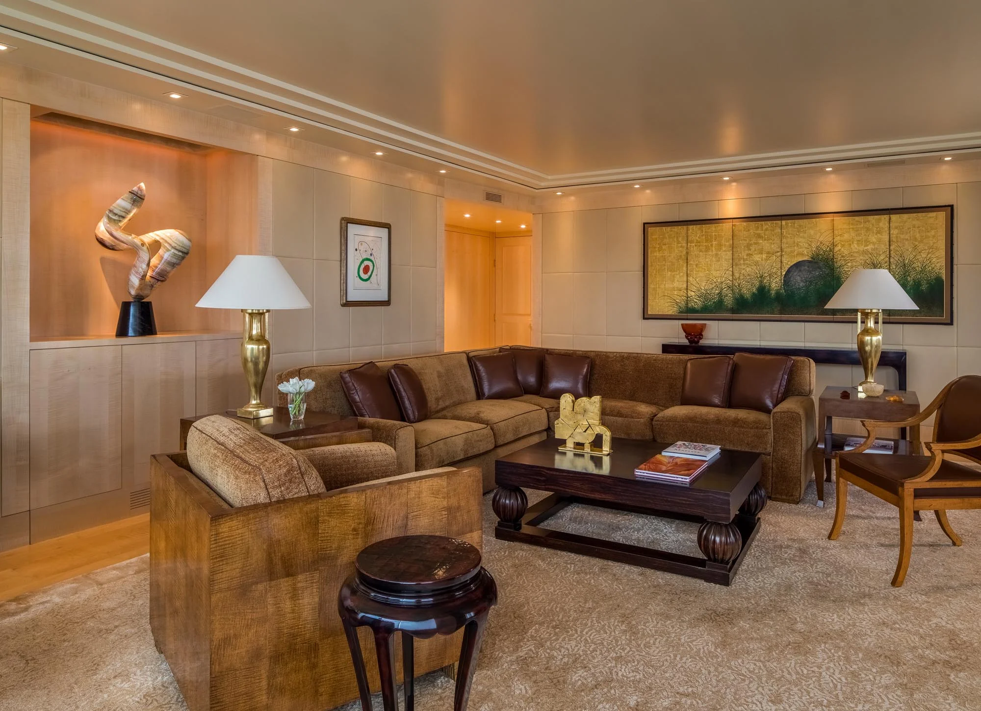 Modern style living room with brown sofa and brown painted walls
