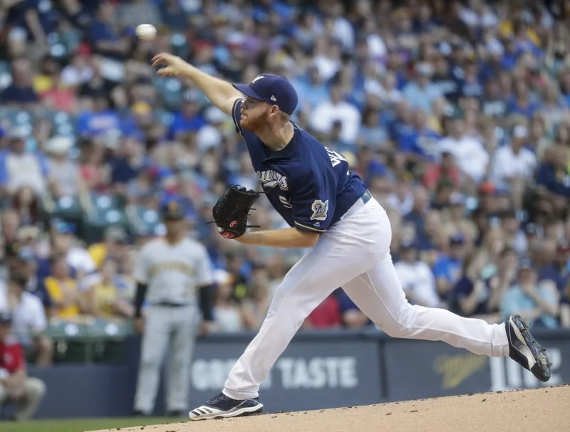 Woodruff wins 10th as Thames, Brewers beat Pirates 3-1